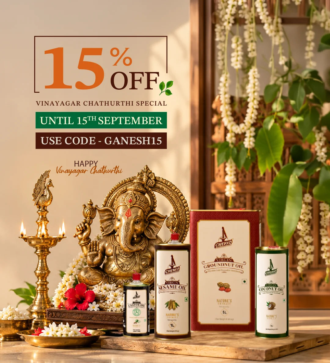 A promotional display for Vinayagar Chauthhuri products featuring multiple packaged food items including a boxed product, two bottles, and two cans, arranged on a wooden surface alongside a brass Ganesha idol, lit oil lamps, and hanging white flowers. Large sale text on the left reads '15% OFF' with the brand name Vinayagar Chauthhuri Special.