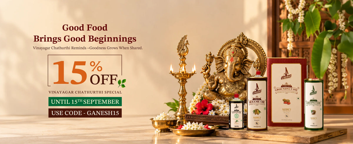 Promotional banner for Vinayagar Chauthhuri Special, featuring a 15% off offer with various packaged food products, including a red box, two bottles, and a jar, styled alongside traditional Indian elements like a brass lamp, Ganesha statue, and flowers on a wooden table.